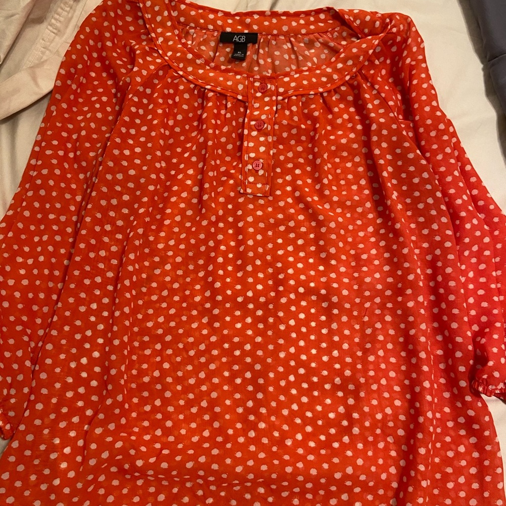 Orange and white polka dot sheer blouse